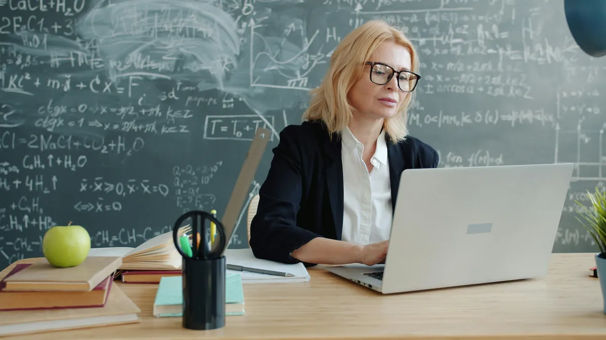 Teacher using a laptop for professional learning